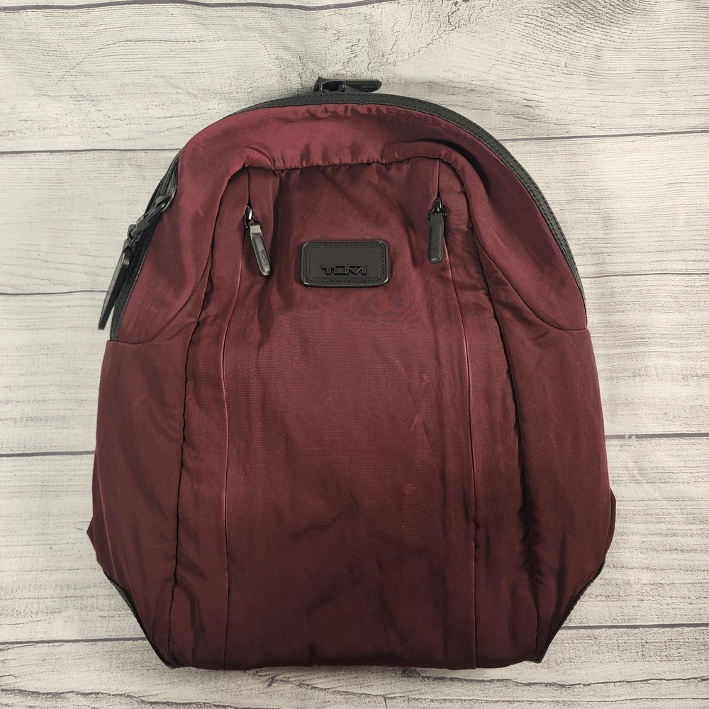 TUMI Women's Burgundy Nylon Sling Backpack Leather Trim Bag